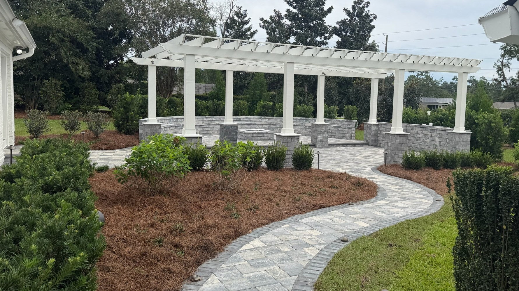 Pergola and paver walkway